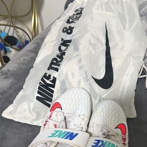 Nike White Shoes with Red and Blue Accents